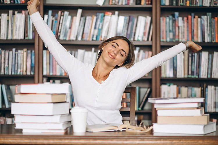 woman stretching in library